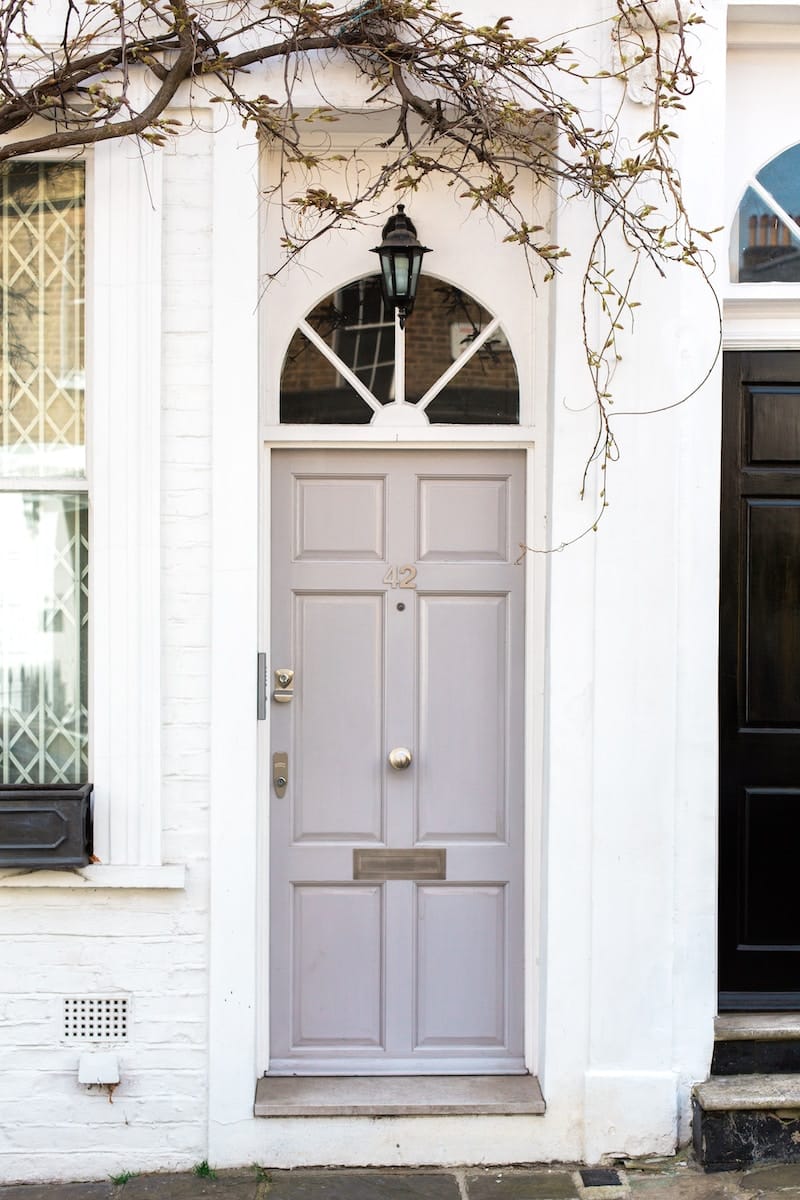 white wooden door mounted white wall